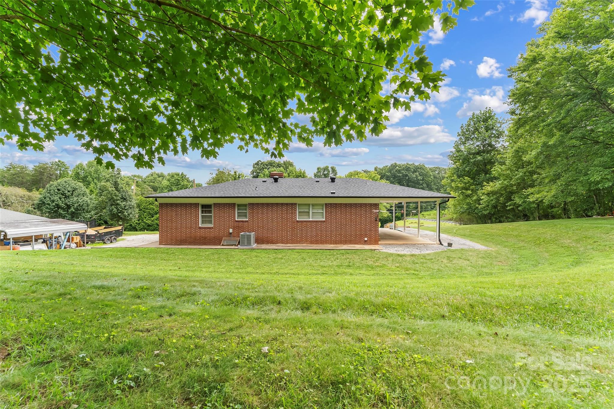 2777 Pax Hill Road Morganton, NC 28655 - Photo 22 of 33 a view of a house with a garden