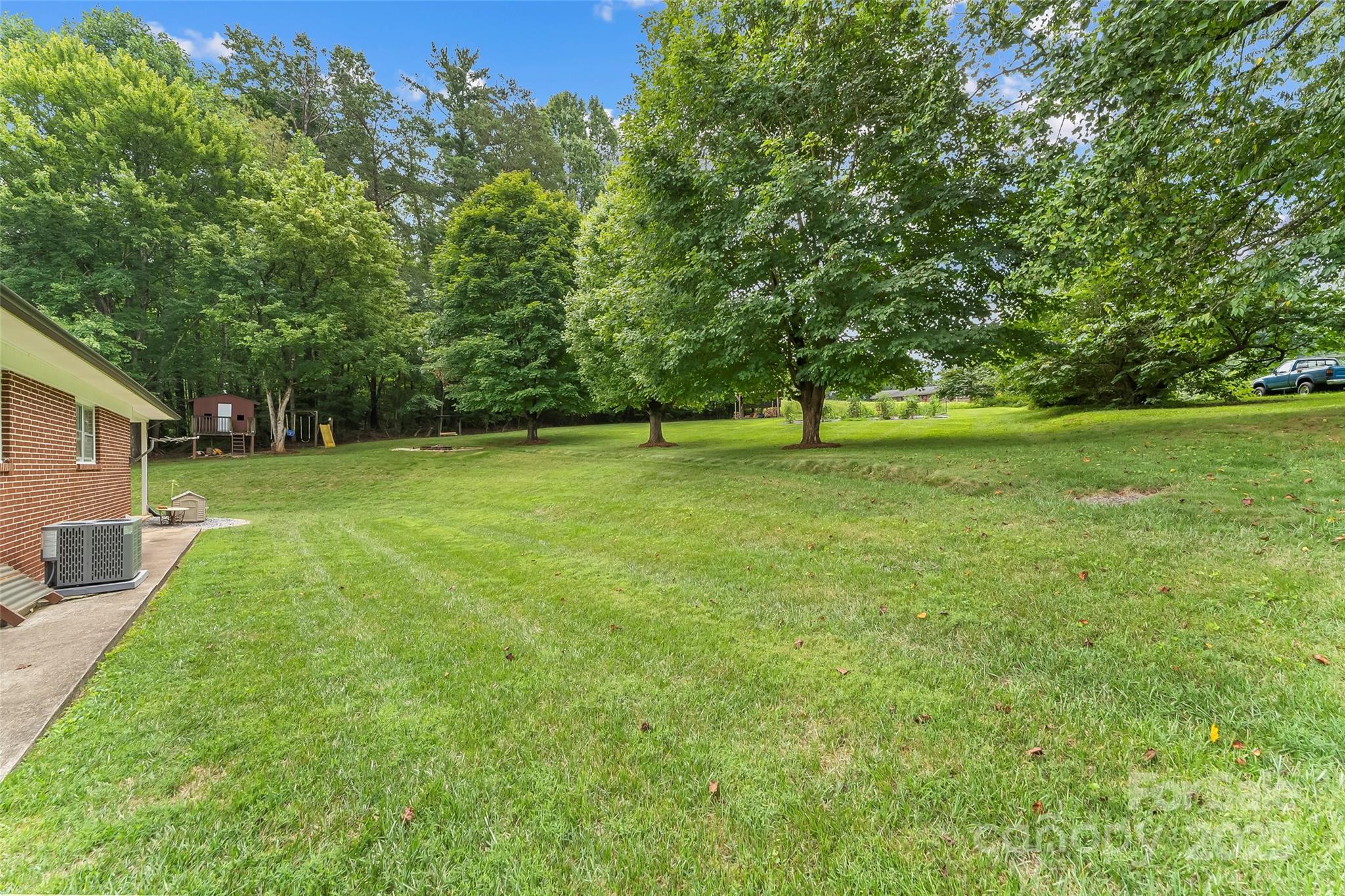2777 Pax Hill Road Morganton, NC 28655 - Photo 23 of 33 a view of a field with a tree