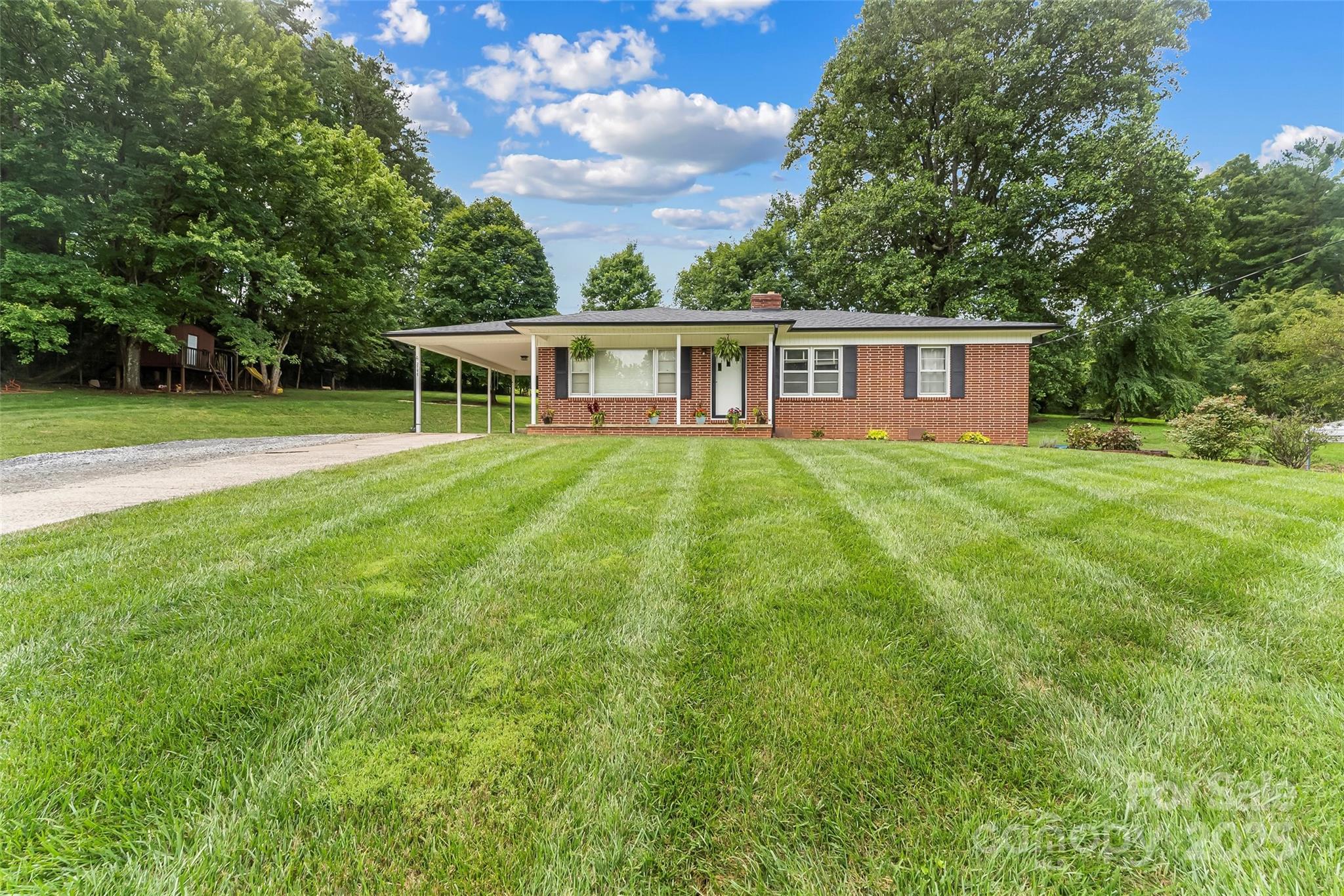 2777 Pax Hill Road Morganton, NC 28655 - Photo 27 of 33 a house view with a garden space