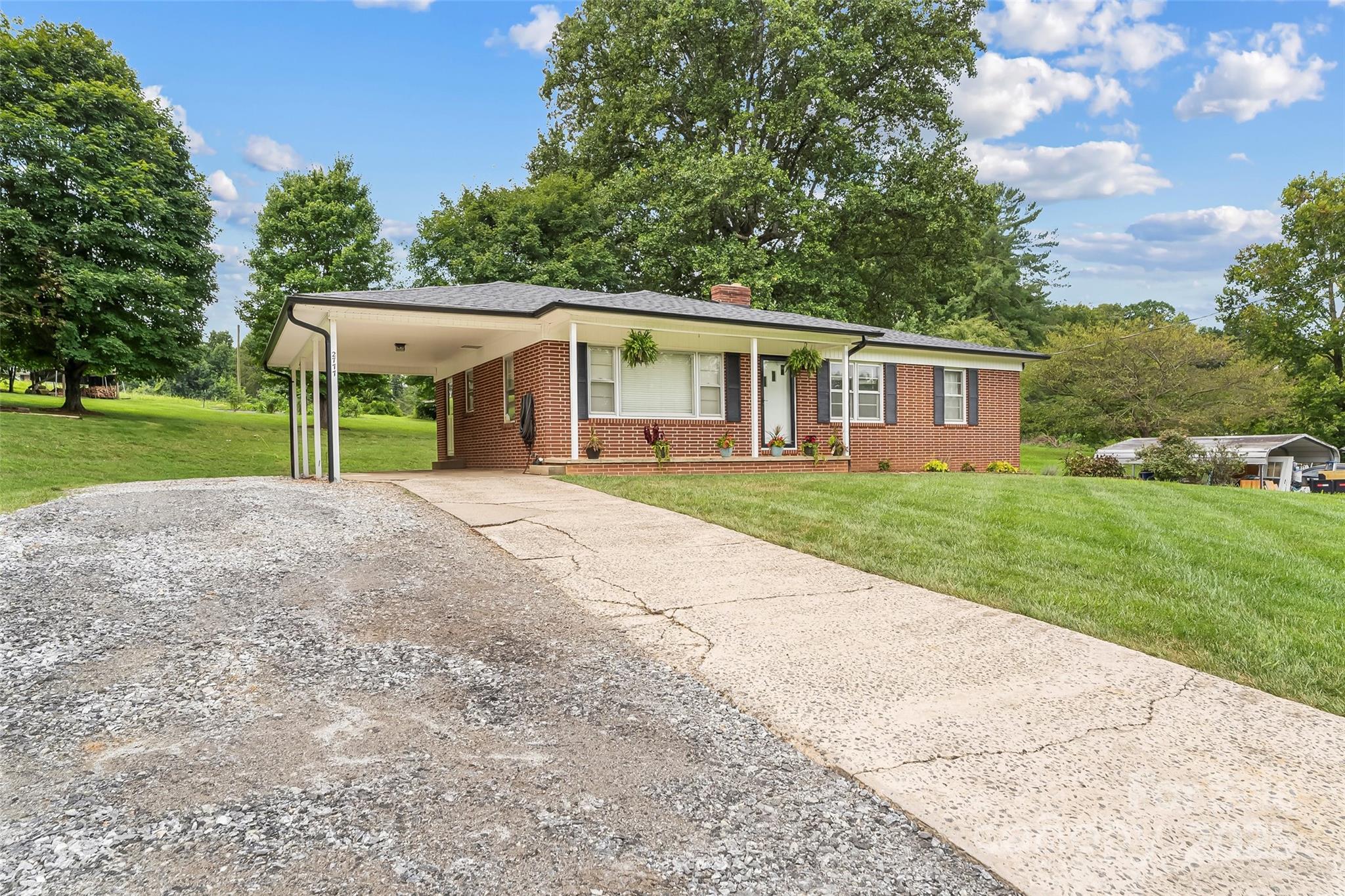 2777 Pax Hill Road Morganton, NC 28655 - Photo 28 of 33 a view of a house with yard and tree s