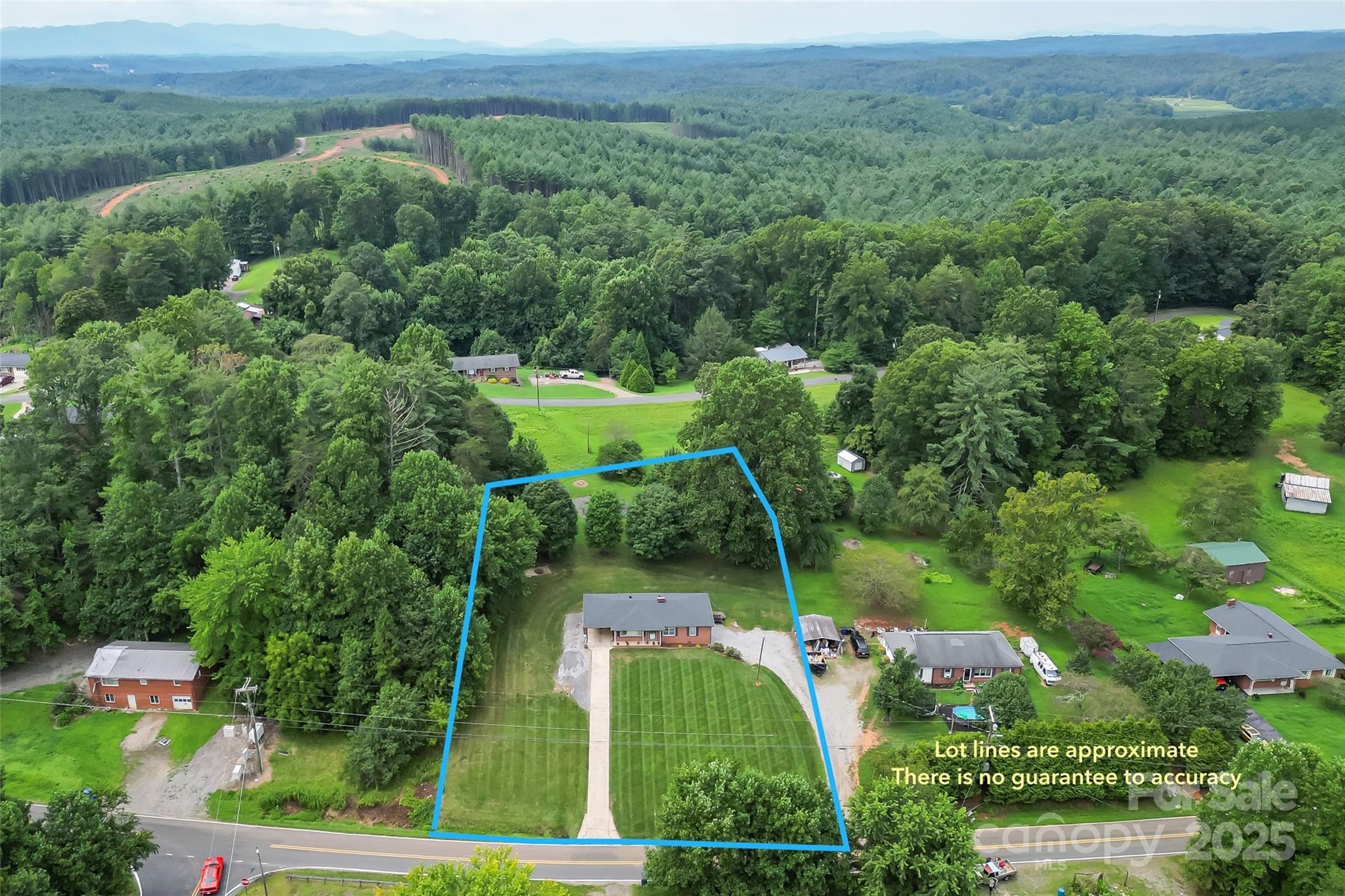 2777 Pax Hill Road Morganton, NC 28655 - Photo 29 of 33 an aerial view of a houses with a yard
