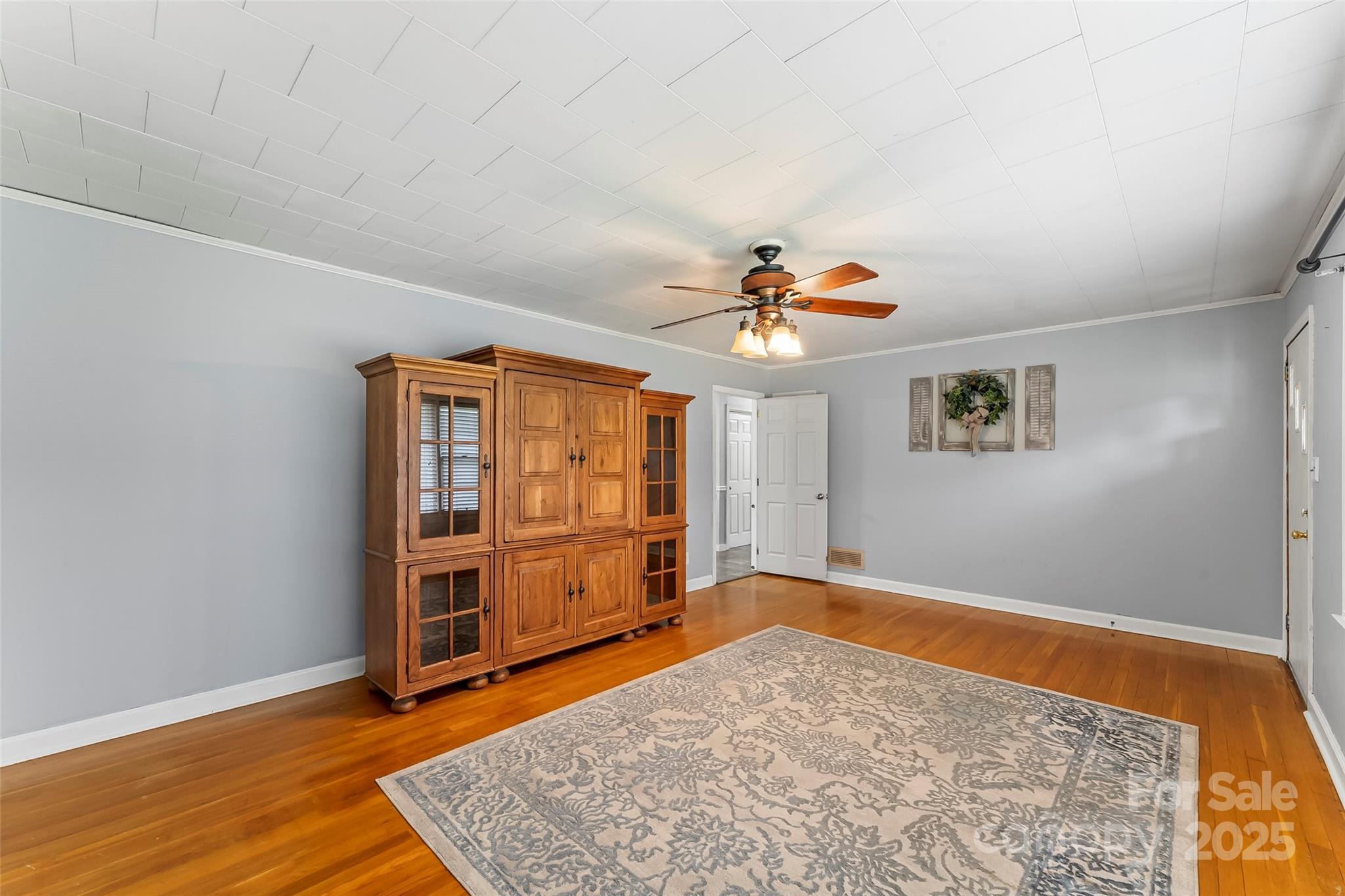 2777 Pax Hill Road Morganton, NC 28655 - Photo 5 of 33 wooden floor in an empty room with a window