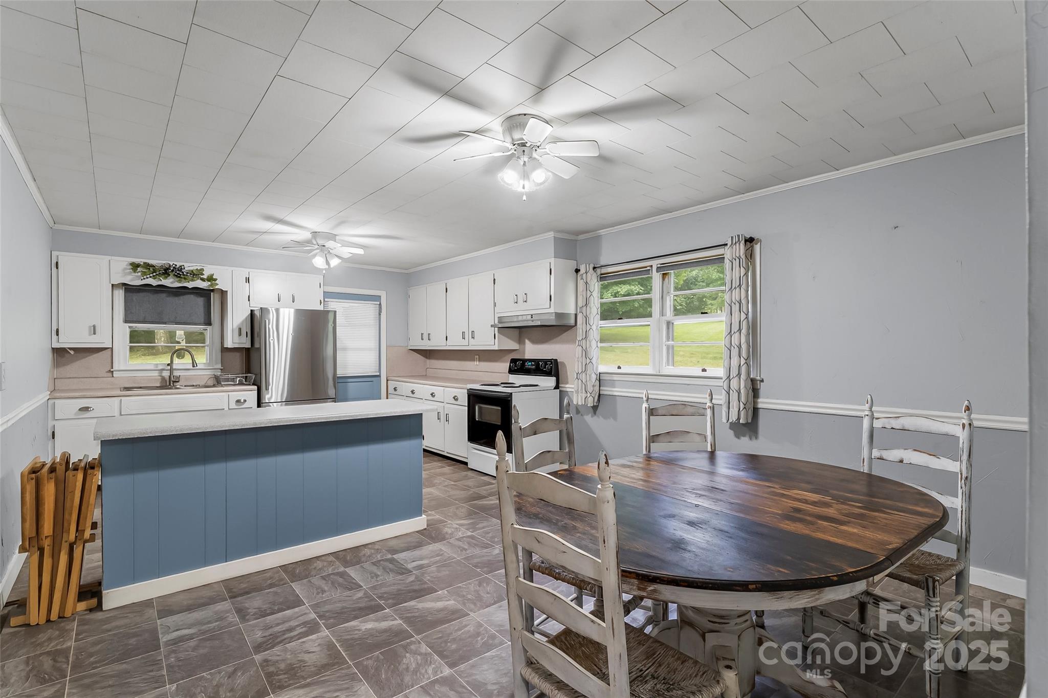 2777 Pax Hill Road Morganton, NC 28655 - Photo 6 of 33 a dining room with furniture and window