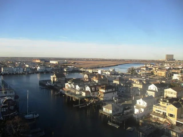 a view of a balcony with chairs