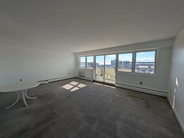 a view of an empty room and window