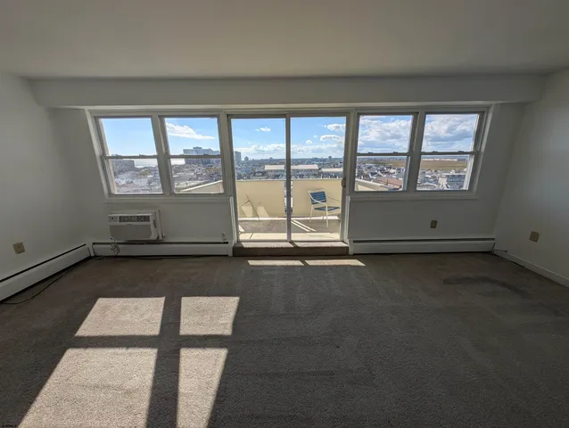 an empty room with a fireplace