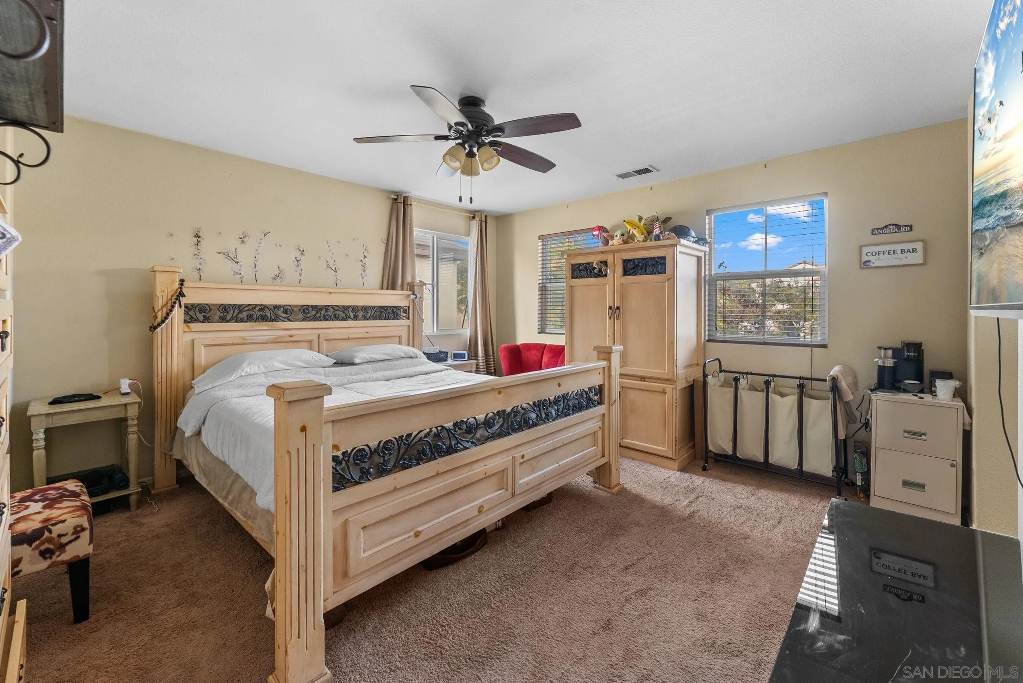 1924 Geyserville Street Chula Vista, CA 91913 - Photo 16 of 37 a bedroom with a bed and a chandelier