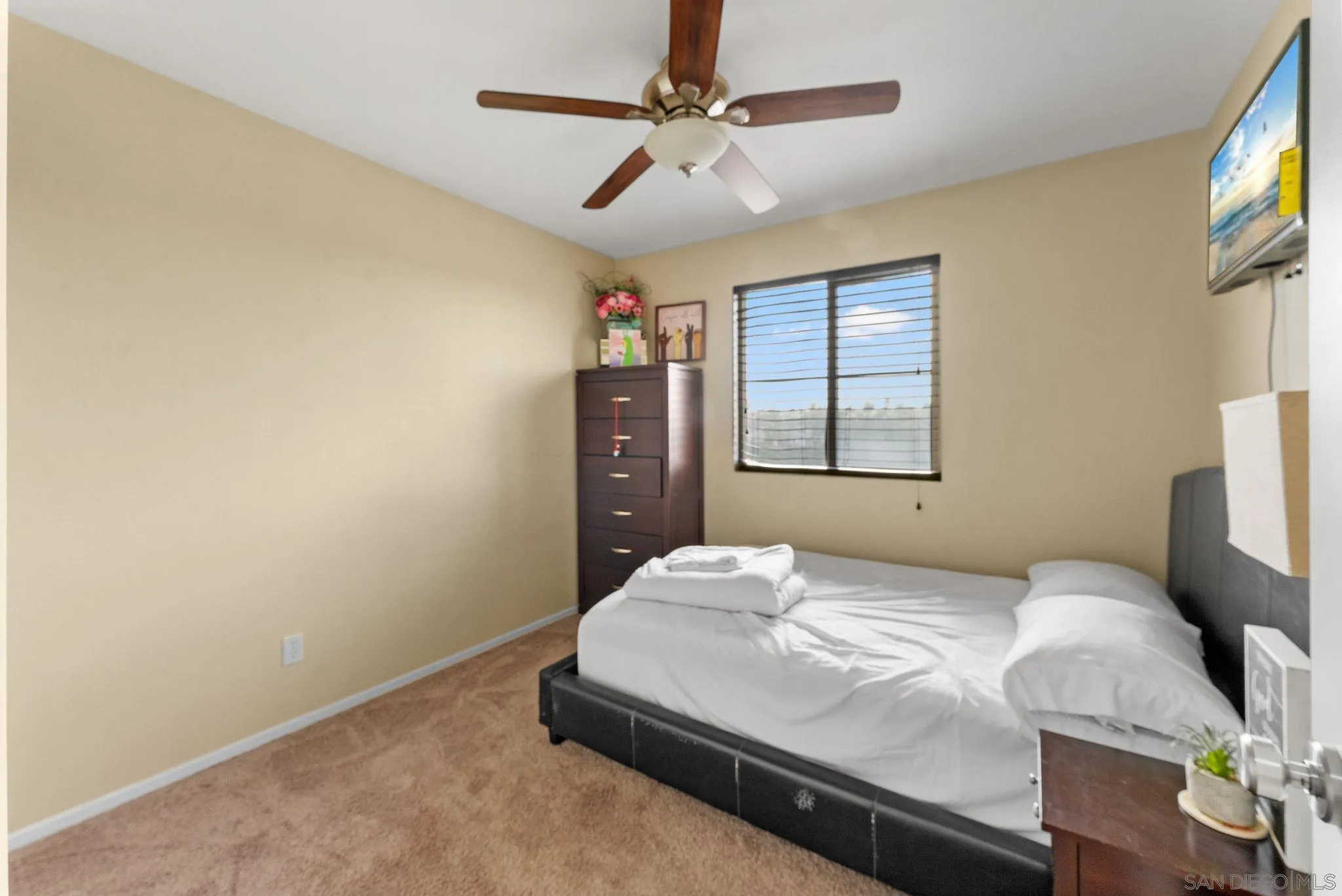 1924 Geyserville Street Chula Vista, CA 91913 - Photo 18 of 37 a bedroom with a bed and a flat screen tv