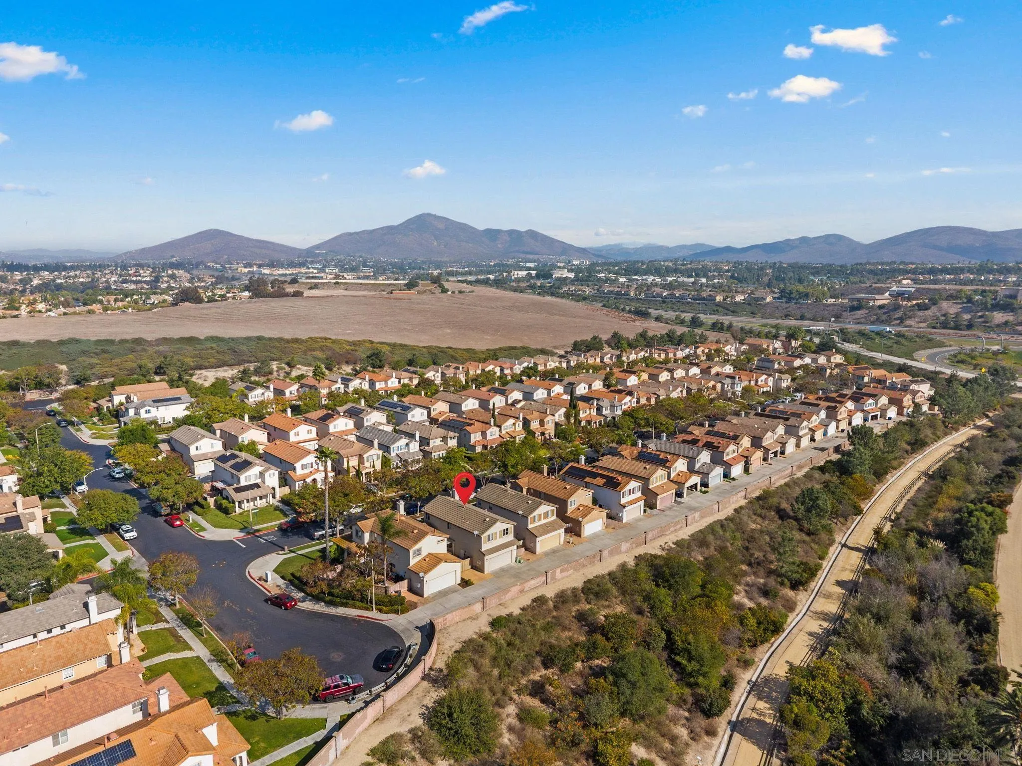1924 Geyserville Street Chula Vista, CA 91913 - Photo 31 of 37 an aerial view of lake and residential houses with outdoor space