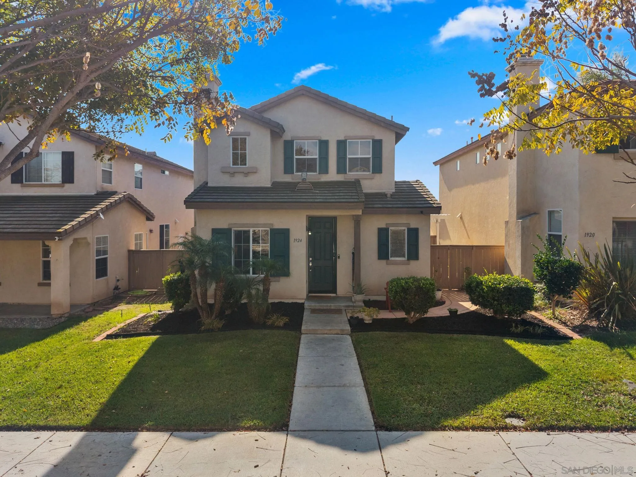 1924 Geyserville Street Chula Vista, CA 91913 - Photo 37 of 37 a front view of a house with a yard and porch