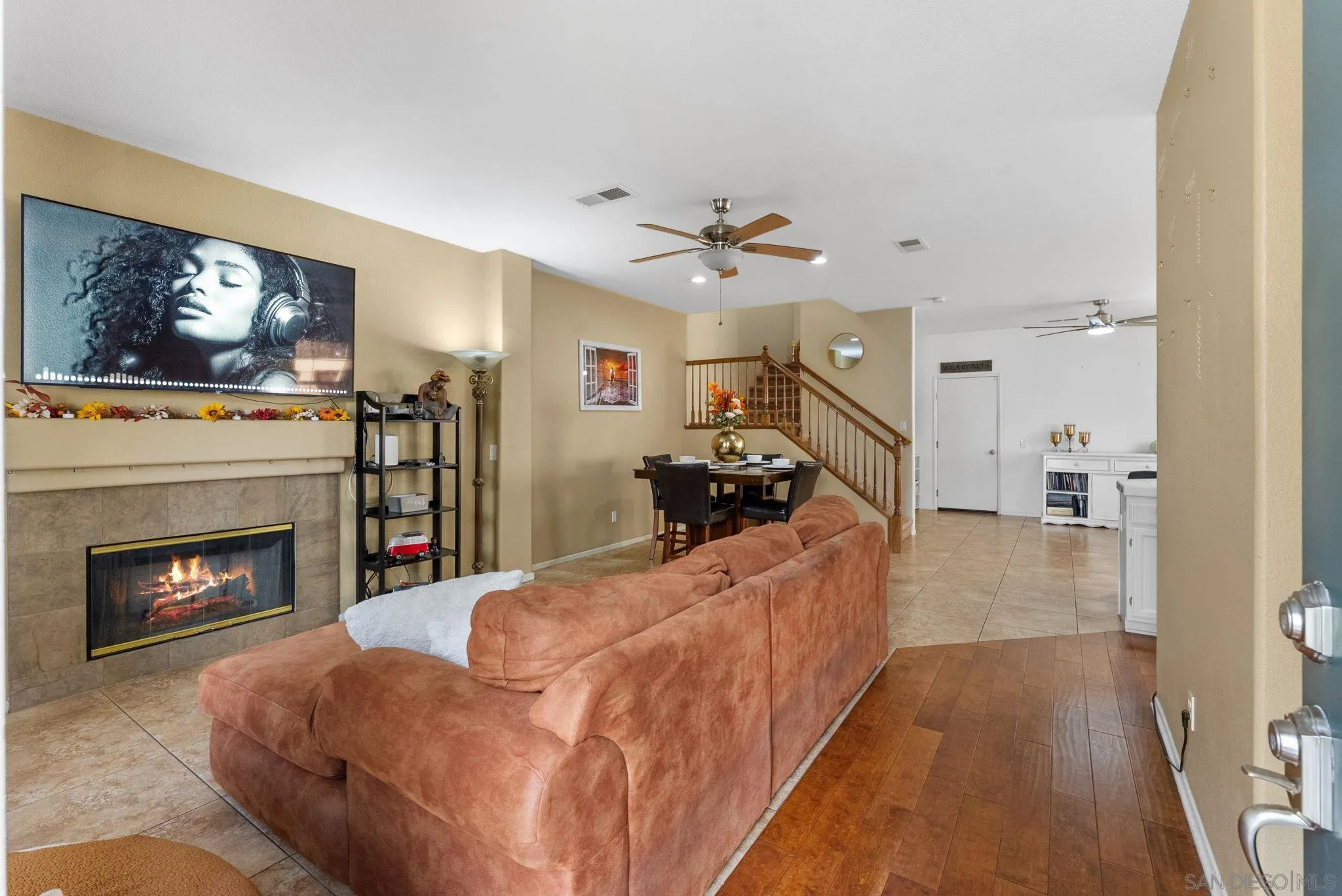 1924 Geyserville Street Chula Vista, CA 91913 - Photo 5 of 37 a living room with furniture a fireplace and a flat screen tv