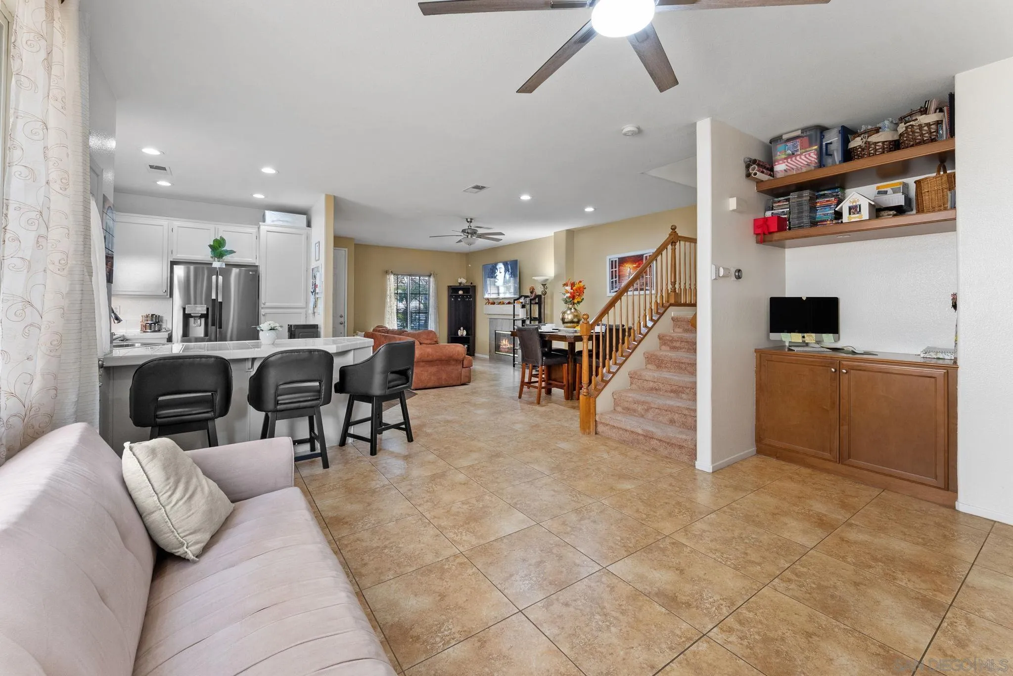 1924 Geyserville Street Chula Vista, CA 91913 - Photo 8 of 37 a living room with furniture kitchen view and a wooden floor