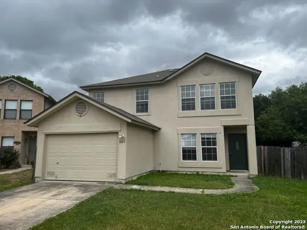 front view of house with a yard