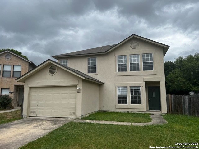 front view of house with a yard