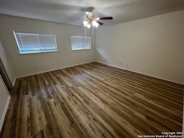 6611 Clouds Point Converse, TX 78109 - Photo 7 of 13 a view of empty room with wooden floor