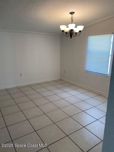 907 Espanola Way Melbourne, FL 32901 - Photo 7 of 7 a view of a chandelier fan and fire place