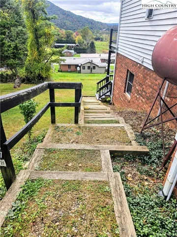 a view of swimming pool with seating area