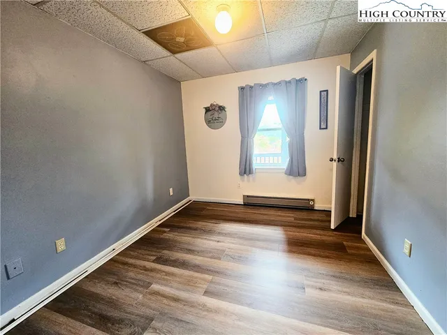 a view of an empty room and window