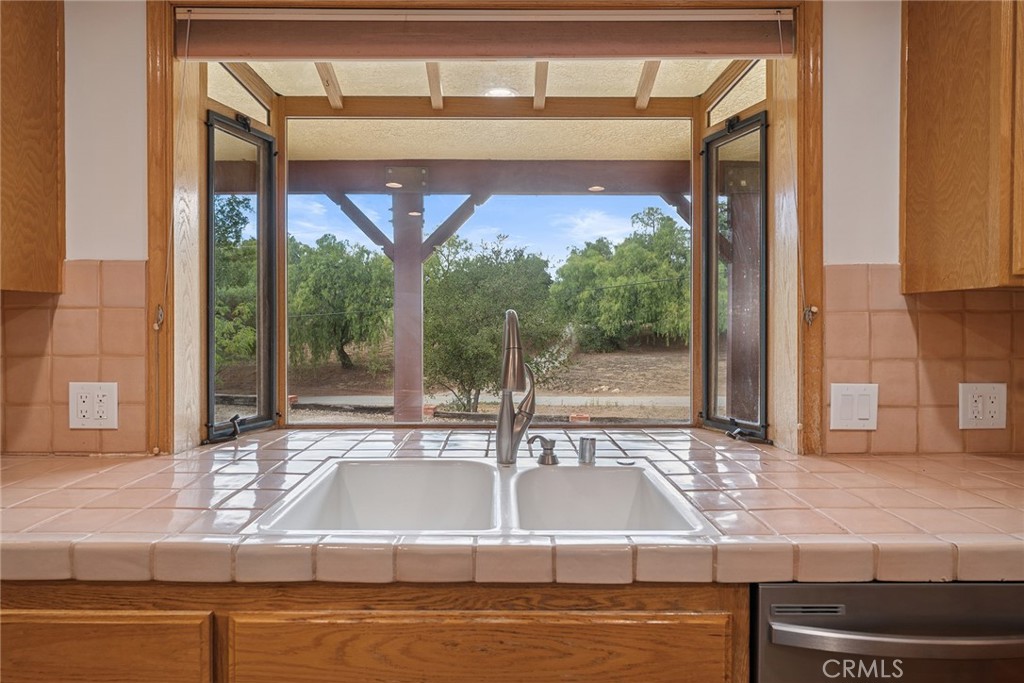 7254 Studio Road Canoga Park, CA 91304 - Photo 15 of 26 a view of a kitchen with a window