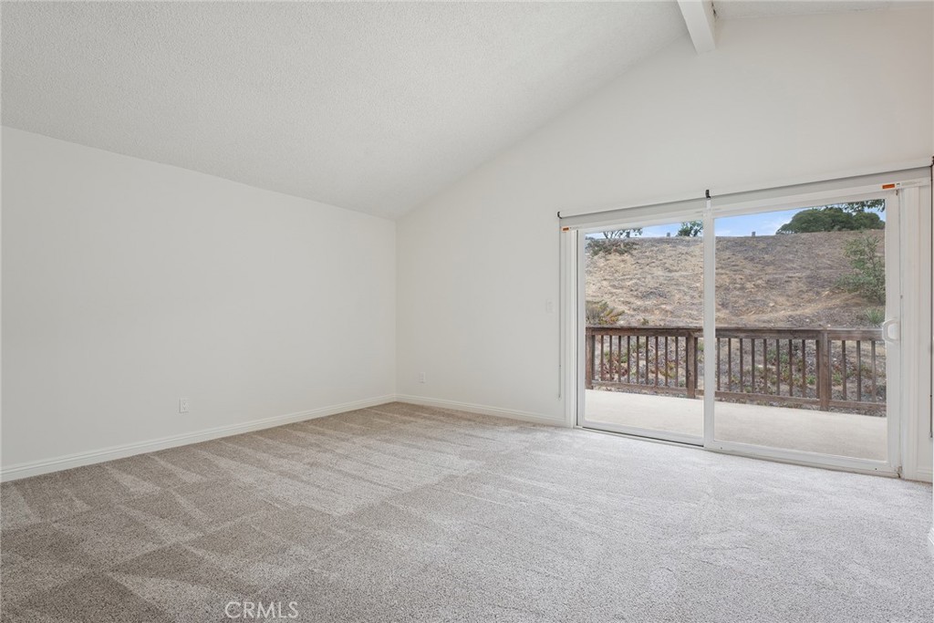 7254 Studio Road Canoga Park, CA 91304 - Photo 17 of 26 a view of an empty room with a window