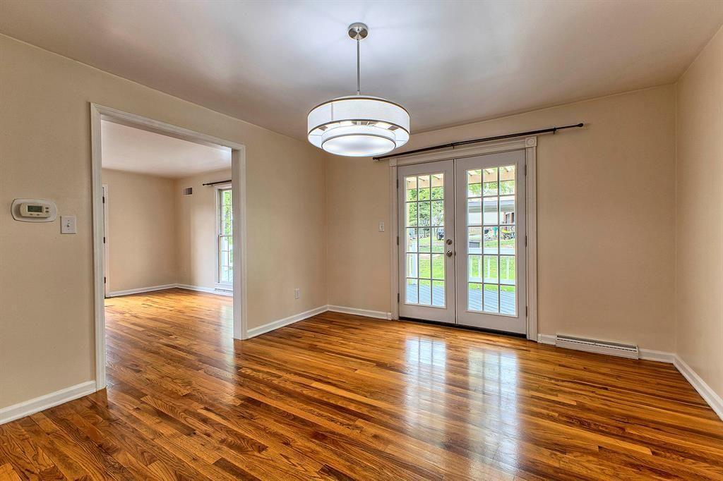 3222 Ridgeway Road Greensburg, PA 15601 - Photo 18 of 46 a view of an empty room with wooden floor and a window