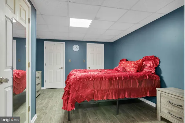 a bathroom with a sink a toilet and shower curtain