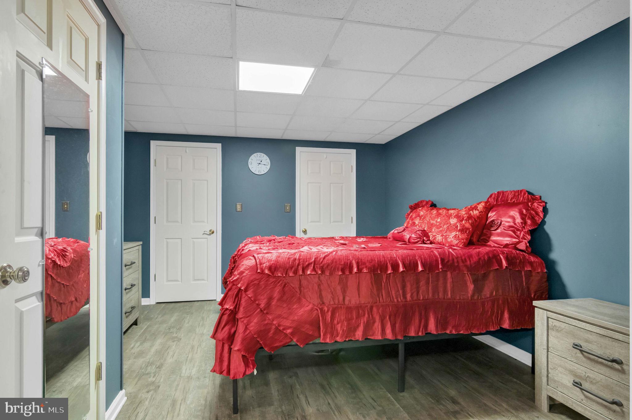 10404 Amherst Circle Fredericksburg, VA 22408 - Photo 24 of 74 a bed sitting in a bedroom next to a window