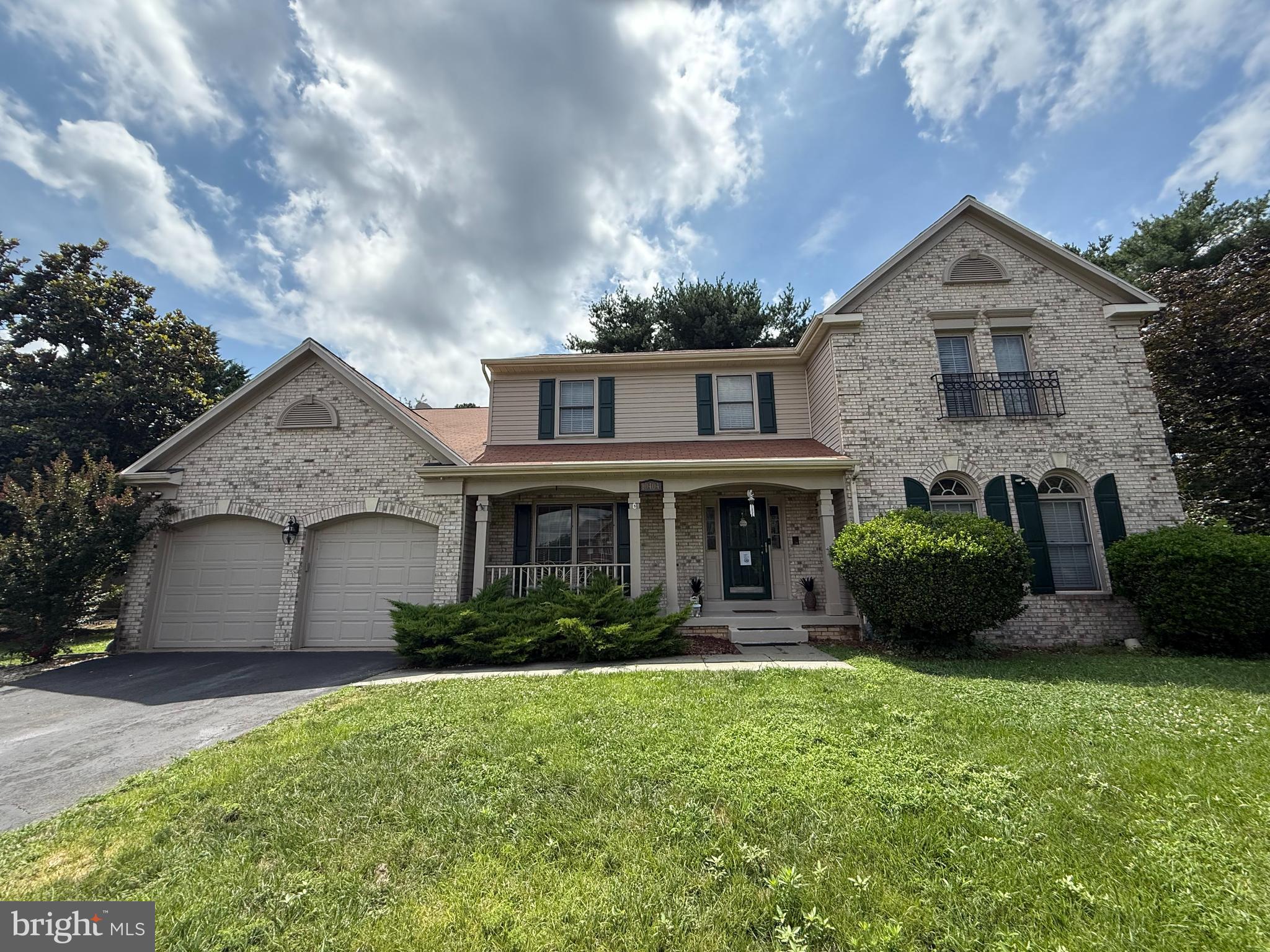 10404 Amherst Circle Fredericksburg, VA 22408 - Photo 25 of 74 a front view of a house with a garden and plants