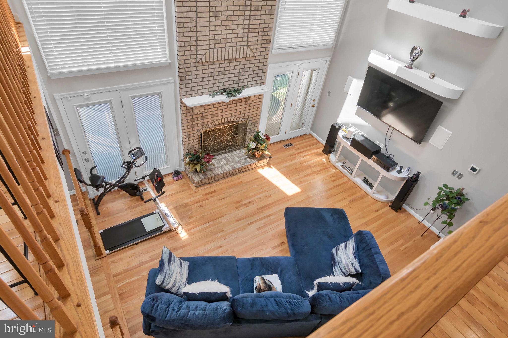 10404 Amherst Circle Fredericksburg, VA 22408 - Photo 38 of 74 a living room with furniture and a flat screen tv