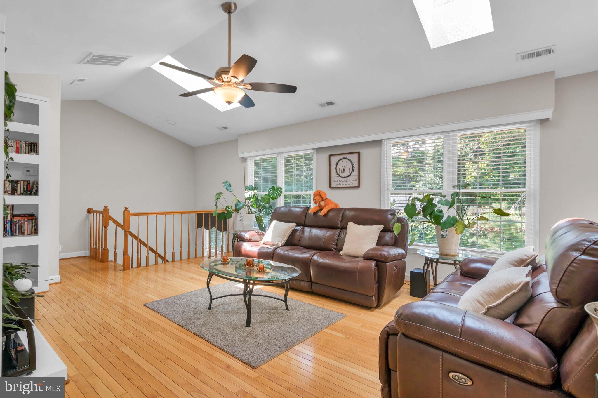 10404 Amherst Circle Fredericksburg, VA 22408 - Photo 45 of 74 a living room with furniture a window and a ceiling fan