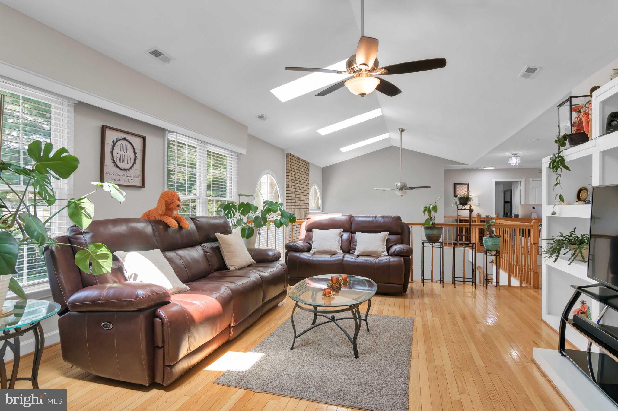 10404 Amherst Circle Fredericksburg, VA 22408 - Photo 46 of 74 a living room with furniture and a wooden floor