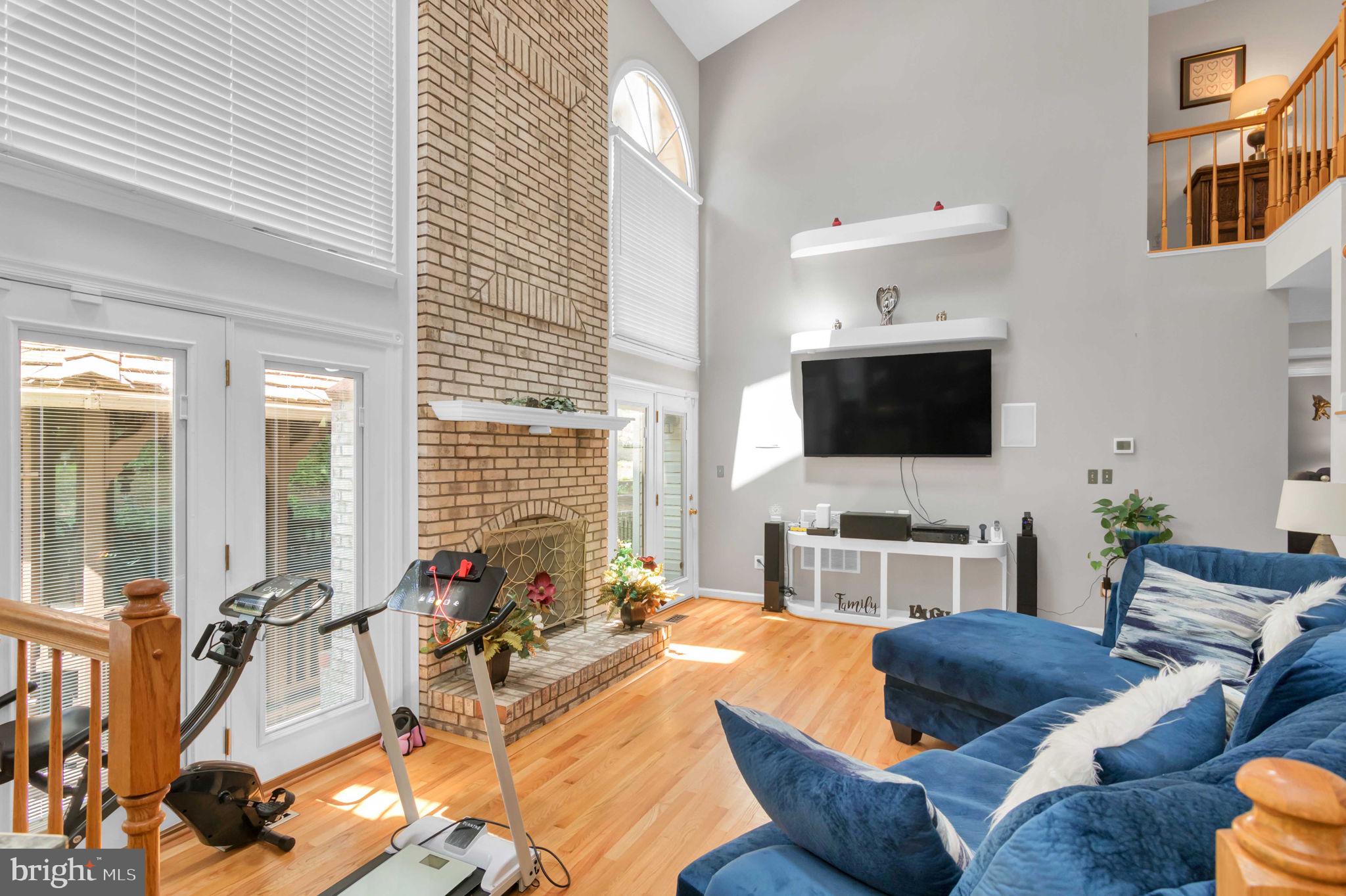 10404 Amherst Circle Fredericksburg, VA 22408 - Photo 54 of 74 a living room with furniture and a flat screen tv