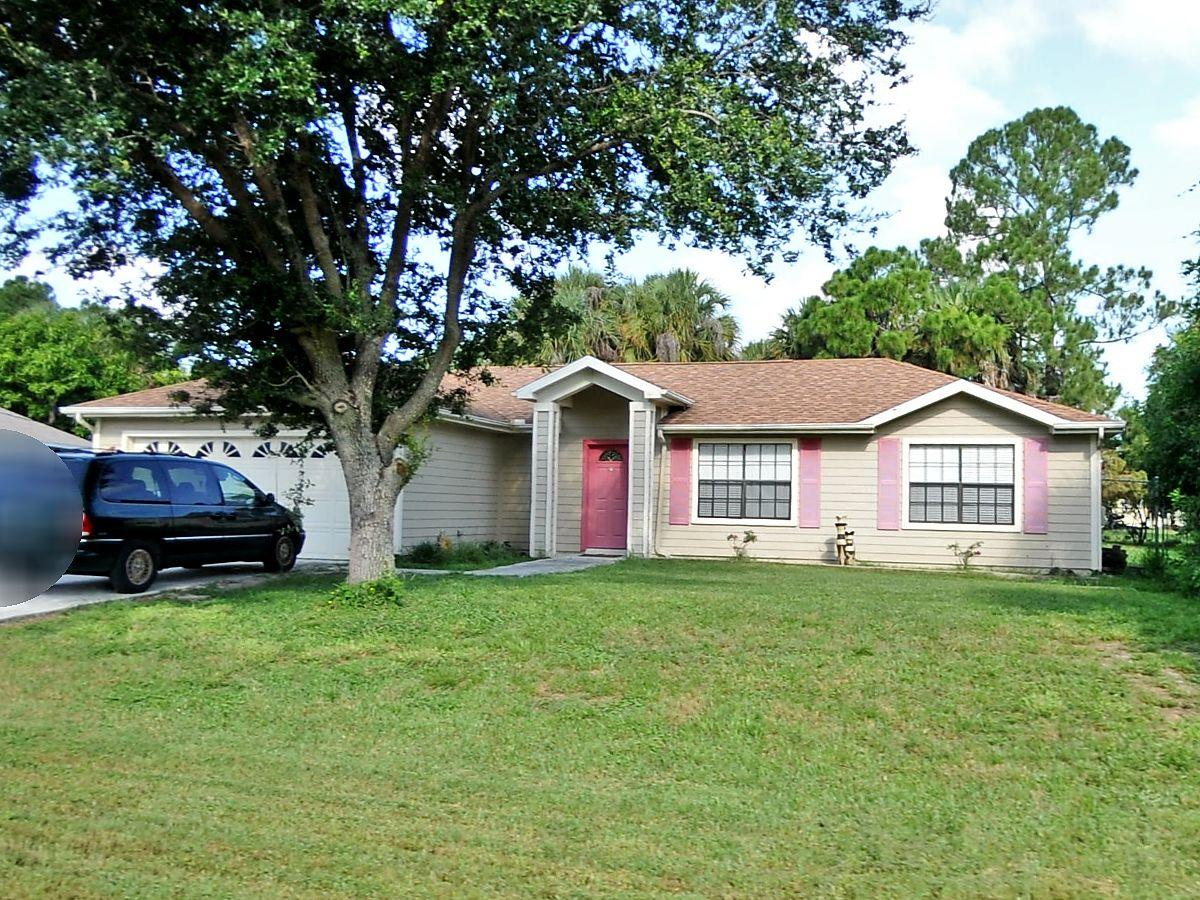 901 Southwest Harvard Road Port St. Lucie, FL 34953 - Photo 1 of 18 Front