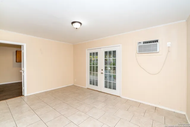 an empty room with windows