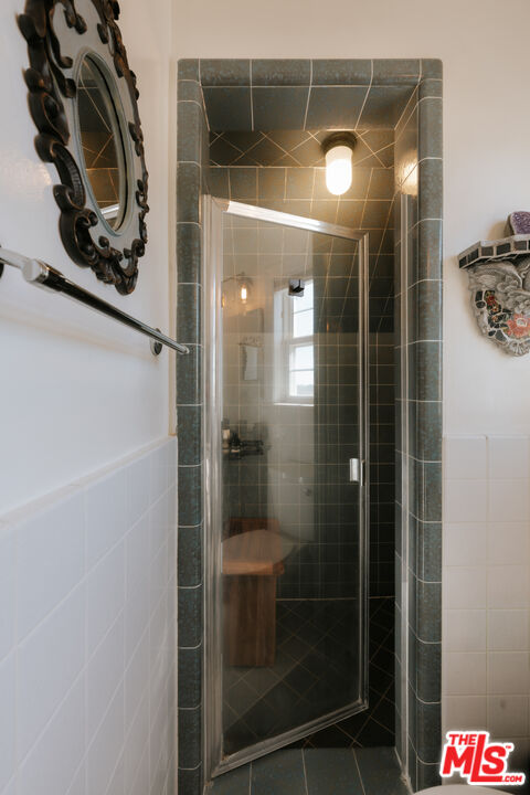 5741 Rolling Road Woodland Hills, CA 91367 - Photo 25 of 37 a bathroom with a shower