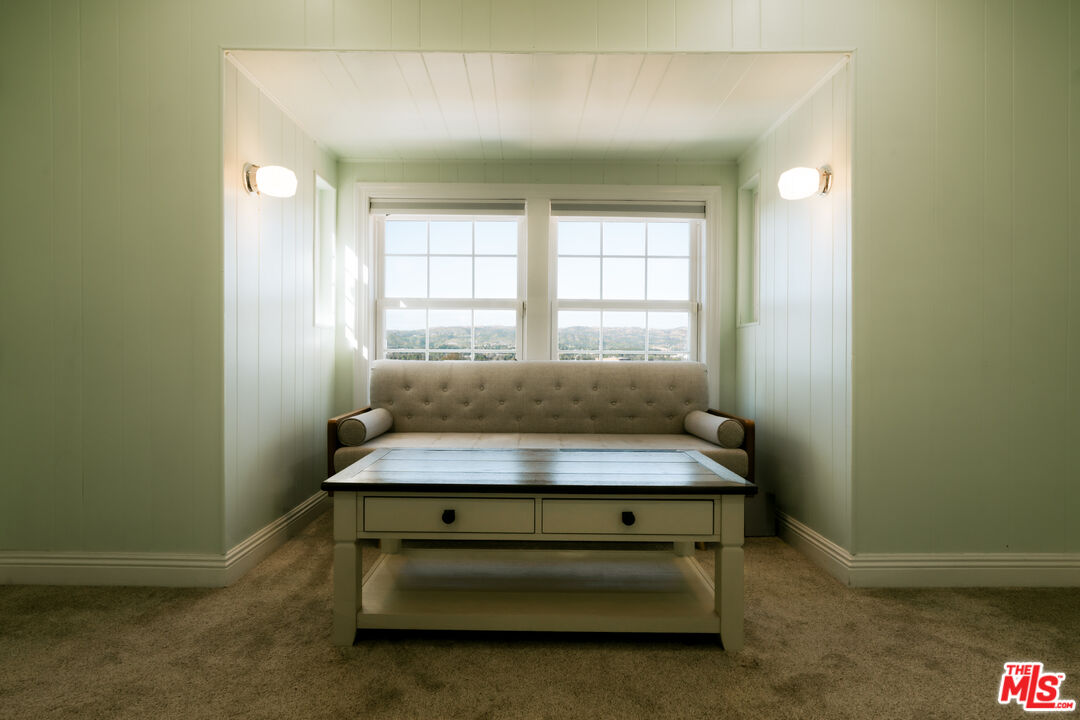 5741 Rolling Road Woodland Hills, CA 91367 - Photo 26 of 37 a view of room with window and wooden floor