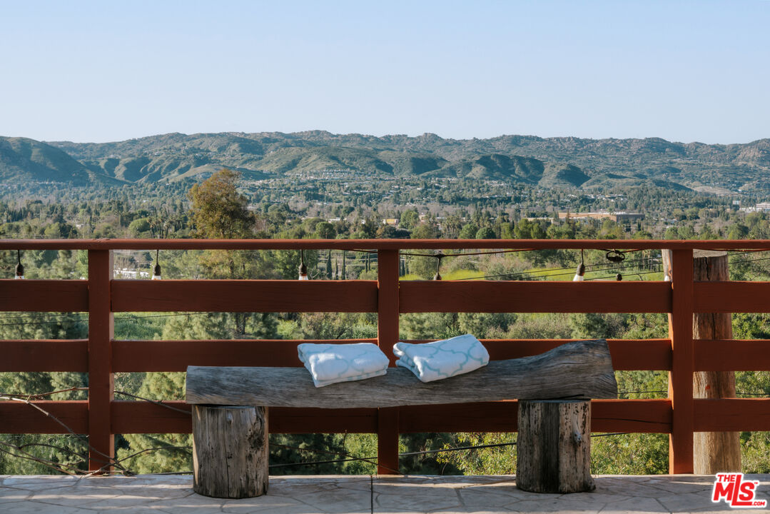 5741 Rolling Road Woodland Hills, CA 91367 - Photo 5 of 37 a view of a lake from a balcony