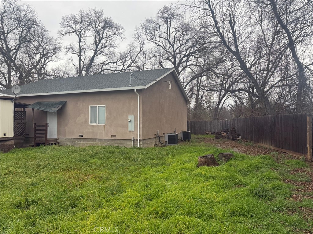 9314 Bonham Road Lower Lake, CA 95457 - Photo 17 of 43 a backyard of a house with table and chairs