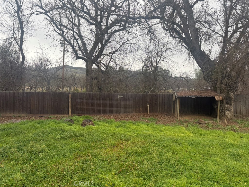 9314 Bonham Road Lower Lake, CA 95457 - Photo 3 of 43 a backyard of a house with lots of green space
