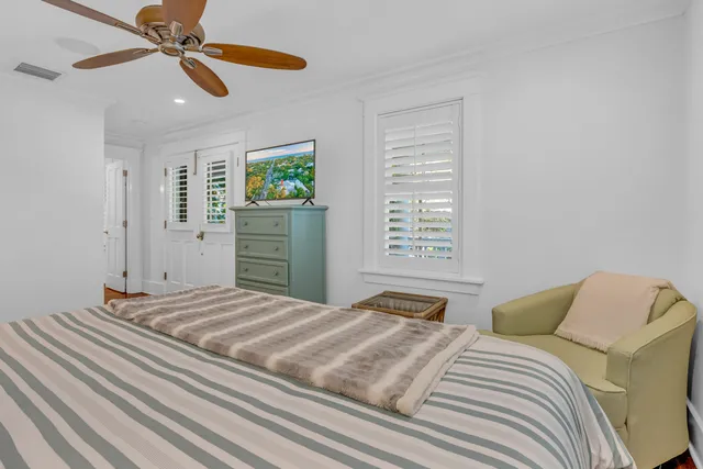 a view of entryway with wooden floor and stairs