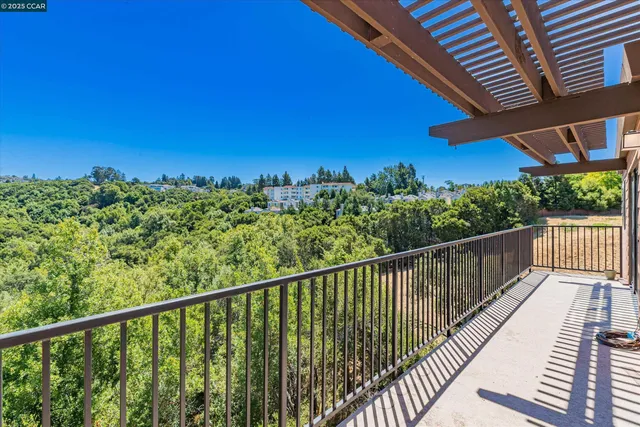 a view of a balcony with outdoor space