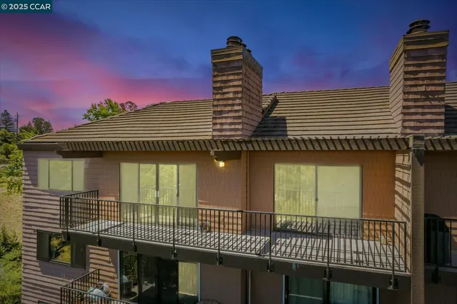 a view of outdoor space with deck and tree