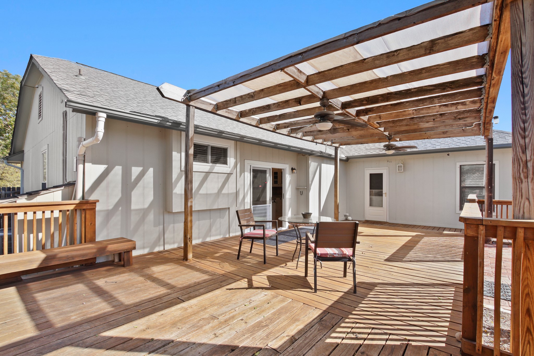 1711 Prairie Hen Cove Austin, TX 78758 - Photo 16 of 18 Wooden deck featuring ceiling fan