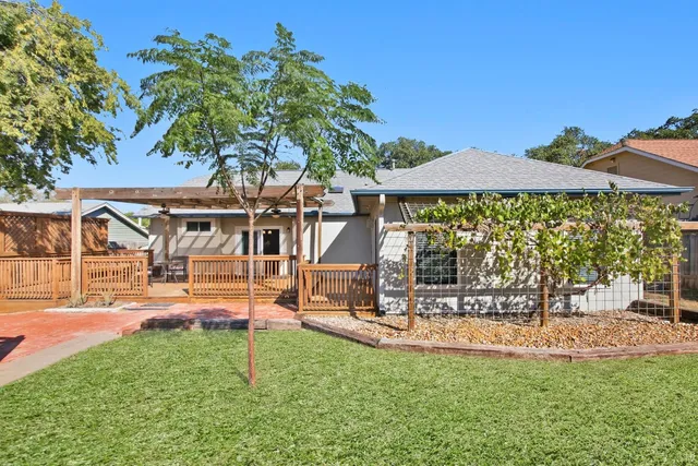 a view of a backyard and a patio