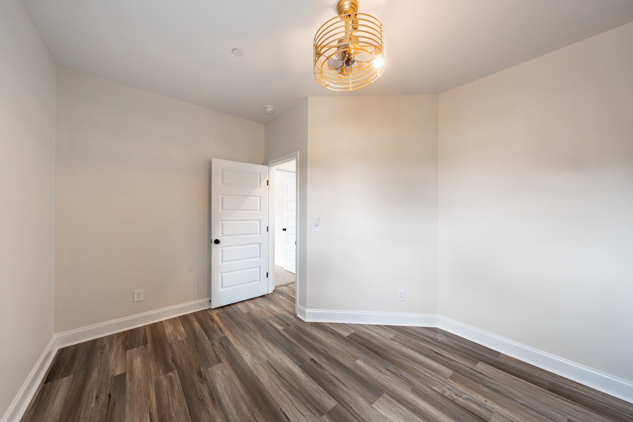 579 Centre Street Pleasant View, TN 37146 - Photo 14 of 36 a view of room with wooden floor
