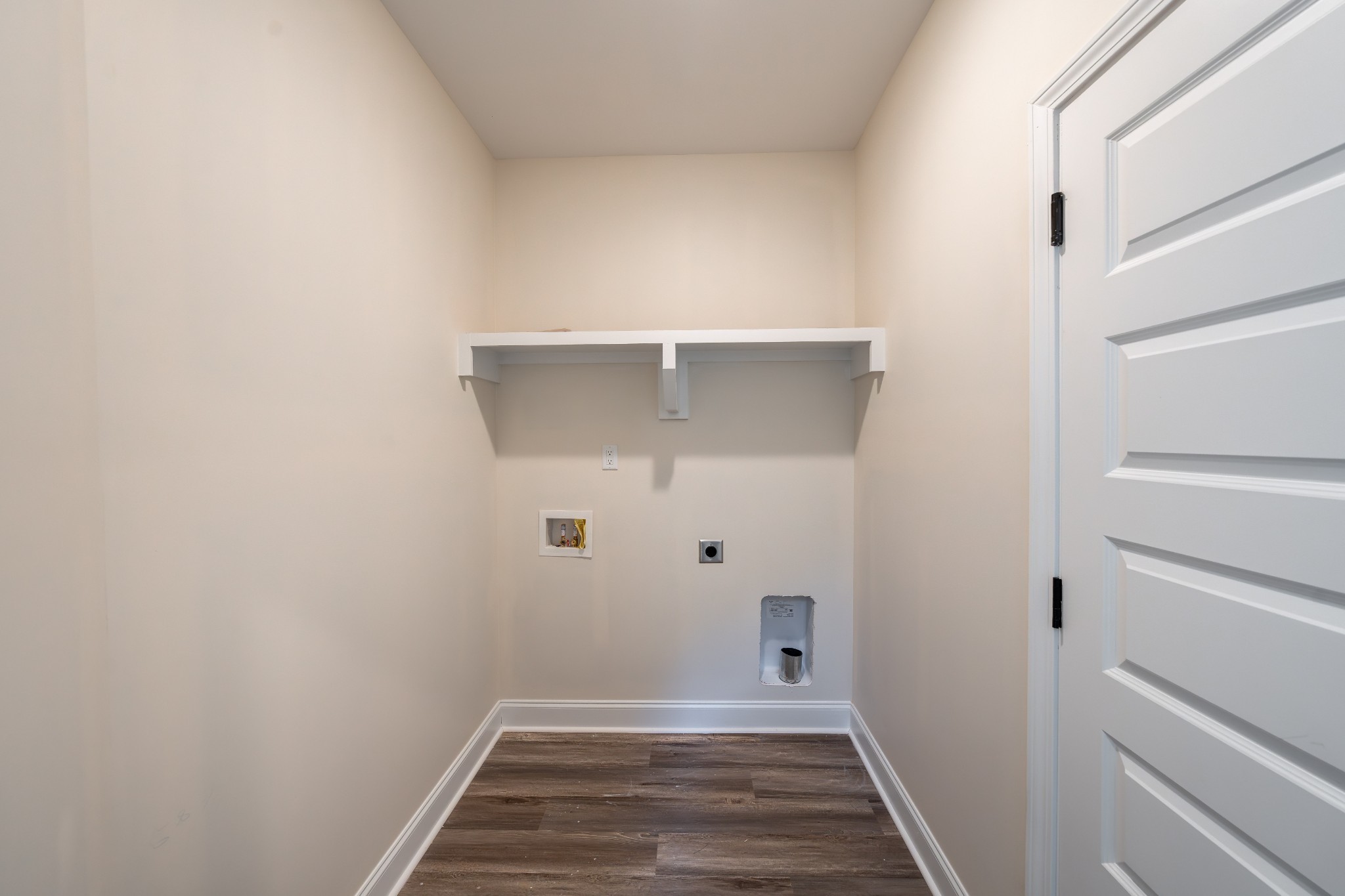 579 Centre Street Pleasant View, TN 37146 - Photo 21 of 36 a view of a hallway with wooden floor
