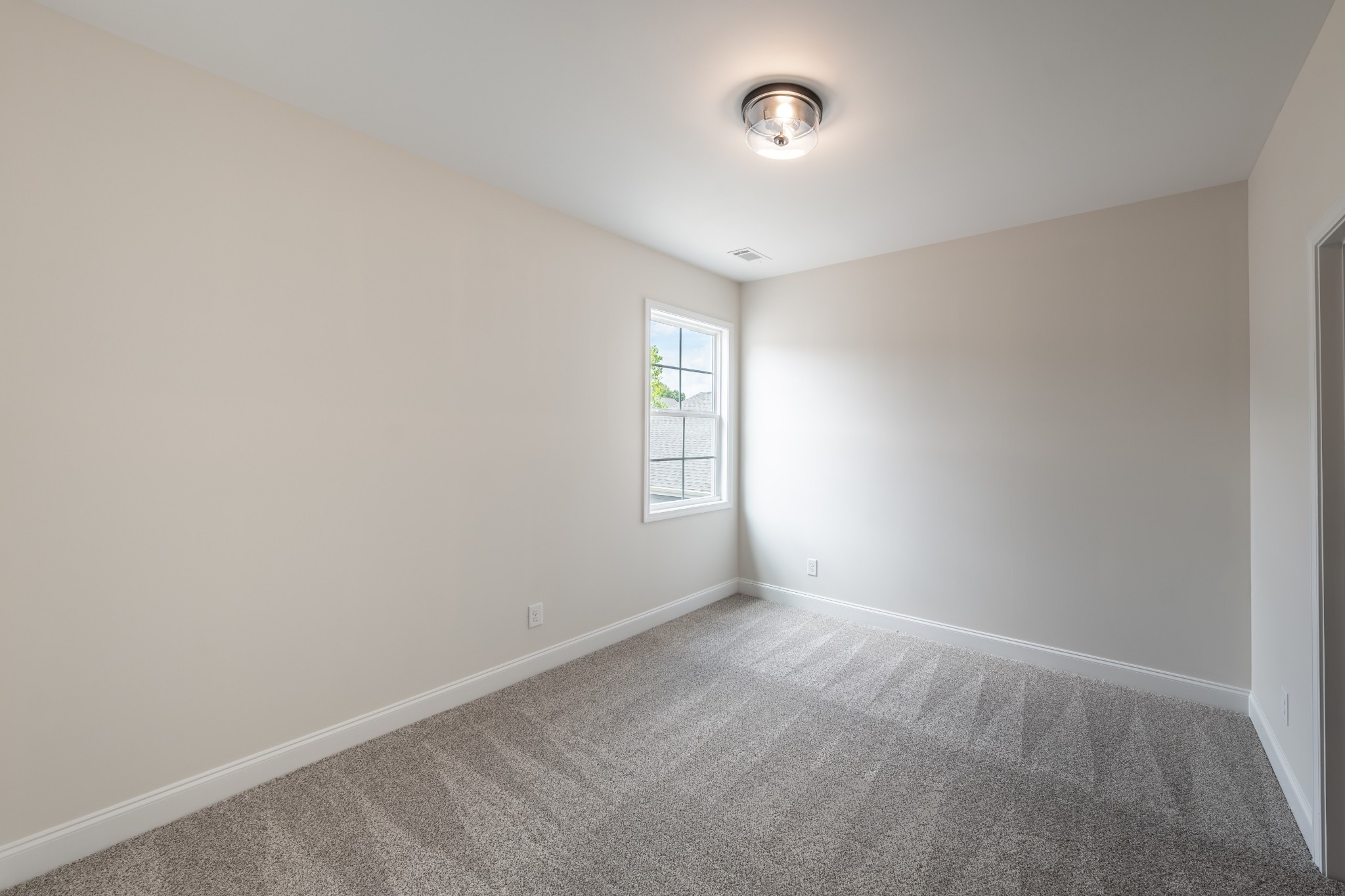 579 Centre Street Pleasant View, TN 37146 - Photo 24 of 36 a view of an empty room with a window