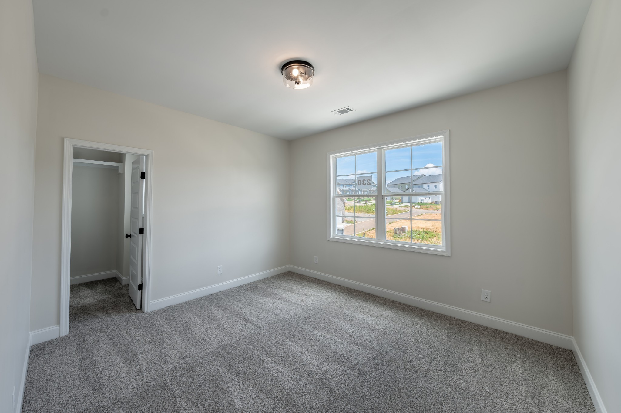 579 Centre Street Pleasant View, TN 37146 - Photo 25 of 36 a view of an empty room with a window