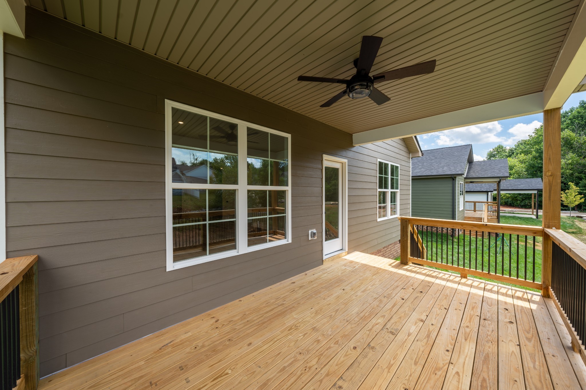 579 Centre Street Pleasant View, TN 37146 - Photo 33 of 36 a view of a house with wooden deck