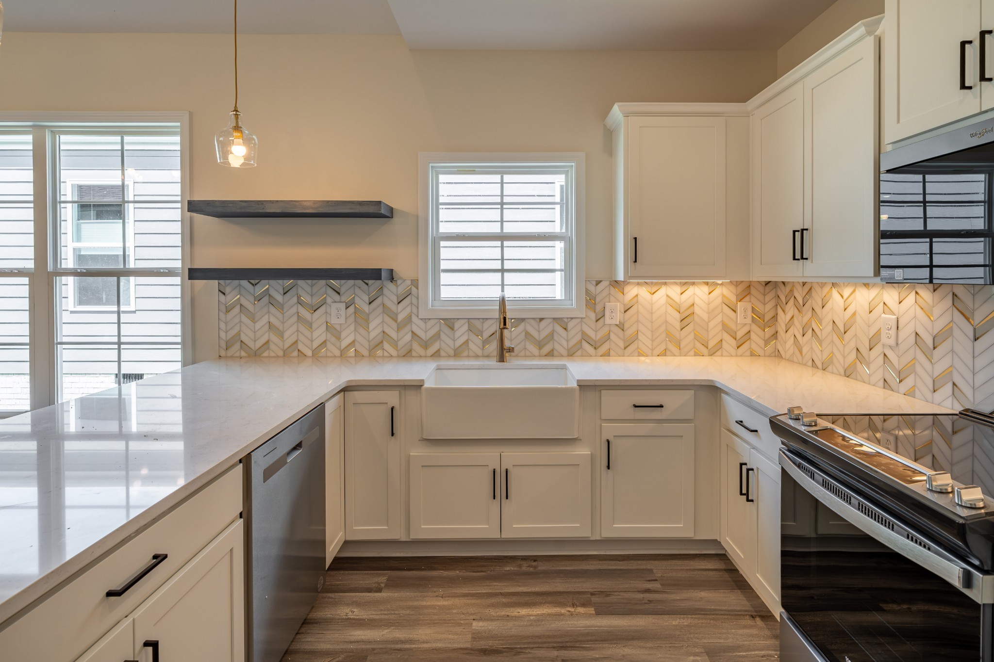 579 Centre Street Pleasant View, TN 37146 - Photo 9 of 36 a kitchen with granite countertop a sink and a stove